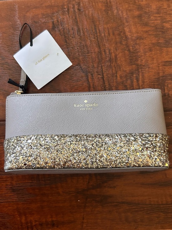 kate spade Handbags - Kate Spade NWT Taupe/Silver Glitter Pouch  bag